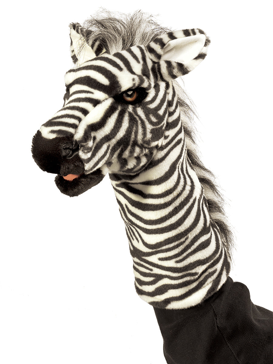 Zebra stage puppet on arm. Zebra has black and white fur and mane. 